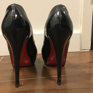 Christian Louboutin black patent leather pumps